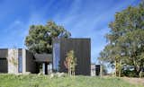 A Concrete-Clad Family Home Rises From the Site of an Old Tennis Court in Australia - Photo 13 of 14 - 