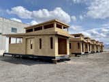 The prefabricated homes will be constructed off-site at the Vurtical factory and then transported to Benloch Ranch for easy installation. This image shows Wheelhaus Wedge tiny homes being constructed at the Vurtical factory, which is another of Mackay's ventures.  Photo 4 of 15 in You Can Buy a Vacation Home Using Bitcoin at This New Luxe Resort in Utah