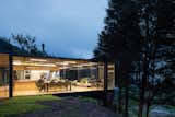 A Family’s Glass-Enclosed Cabin Hovers in a Pine Forest in Ecuador - Photo 15 of 19 - 