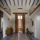 Doors, Wood, and Swing Door Type  Photo 1 of 16 in An Old Brick House in Spain Becomes a Light-Filled Family Home