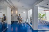 A Cramped Attic Apartment in Madrid Is Revived With Mirrored Walls and a Blue Floor - Photo 10 of 15 - 