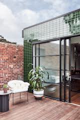The Shiny Tile Wrapping This Melbourne Home Reflects the Greenery Around It - Photo 7 of 12 - 