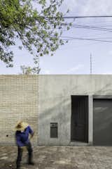  Photo 1 of 21 in A Brick Home in Mexico City Encloses a Series of Lush Courtyards