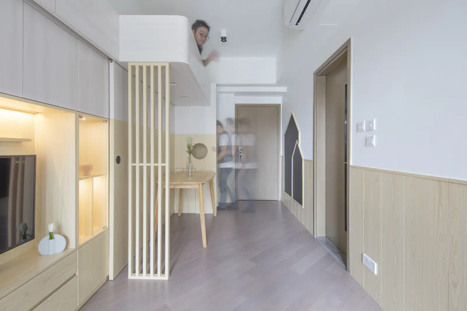 photo-1-of-18-in-a-tiny-apartment-in-hong-kong-uses-adaptable-joinery