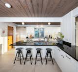 The kitchen bench can seat up to four, allowing for casual family meals.  Photo 8 of 14 in This Pristine Eichler in Oakland, California, Just Fetched $2.2 Million
