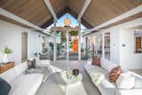 The rear of the living room looks onto the landscaped atrium at the entrance, allowing the home to feel intimately connected to the outdoors.  Photo 6 of 14 in This Pristine Eichler in Oakland, California, Just Fetched $2.2 Million
