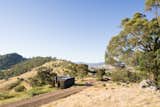 An Off-Grid Shipping Container Home Perches at the Foothills of the Victorian Alps - Photo 2 of 13 - 