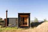 An Off-Grid Shipping Container Home Perches at the Foothills of the Victorian Alps - Photo 3 of 13 - 