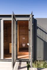 An Off-Grid Shipping Container Home Perches at the Foothills of the Victorian Alps - Photo 7 of 13 - 