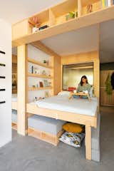 Putting the bed in a lowered position creates storage space underneath.