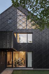 In Sweden, Two Matching Homes Nest Under One Black Gable Roof - Photo 5 of 18 - 