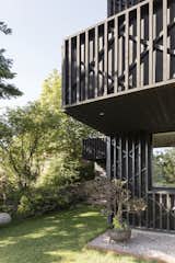 In Sweden, Two Matching Homes Nest Under One Black Gable Roof - Photo 15 of 18 - 