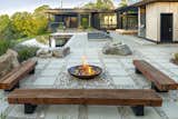 Combine native plants with rockscapes to create gardens that don’t need excessive irrigation. 