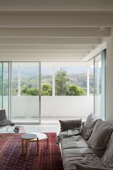 The standard approach on the balcony would be to use a glass balustrade—however this would open the view up to the road, passersby, and an adjacent car park. “This means that the living room is truly private, even though it is in a prominent spot,” explains architect Jeffery Bokey-Grant.