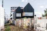 A Striking Black Residence Energizes a Neglected Lot and Its Neighborhood in Melbourne