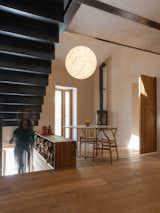 A Floating Iron Stair Cuts Through a Bladesmith’s Workshop Turned Residence in Italy - Photo 12 of 16 - 