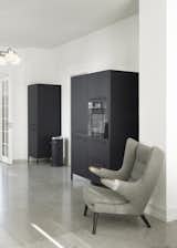 Thomas has owned a lot of the pieces in the home for many years. He’s particularly fond of the vintage Papa Bear Chairs by Hans J. Wegner, which have accompanied him through several moves. “It’s a classic, timeless design, yet incredibly comfortable,” he says.