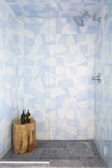 The girls’ bathrooms on the lower level of the home feature tiles from the Concrete Collaborative Strand collection. One bathroom features a Dove and Powder Blue colorway, and the other an Ivory and Tumi colorway.