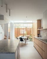 Kitchen and dining area of Reeded House by Oliver Leech Architects