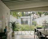 Dining Room of White Patio House by Pashenko Works