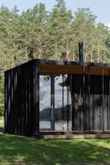 The cabin is manufactured in Lithuania and comes as a modular building that requires no particular foundation. This allows it to be constructed on-site within a single day. “The signature of the KONGA Cabin is simplicity and elegance,” says architect Mette Fredskild. “It is focused on meeting basic needs.”