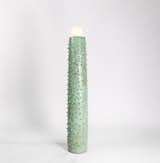 The Ceiba lamp by Chuch Estudio is handmade of clay and mineral oxides. It takes inspiration from the thorny trunk of a ceiba tree and the work of legendary designers Jean Royère and Gio Ponti.