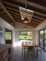 <span style="font-family: Theinhardt, -apple-system, BlinkMacSystemFont, &quot;Segoe UI&quot;, Roboto, Oxygen-Sans, Ubuntu, Cantarell, &quot;Helvetica Neue&quot;, sans-serif;">A large picture window in the living space frames the garden. The garden rises up towards the rear of the site and the window sill is close to ground level. </span><span style="font-family: Theinhardt, -apple-system, BlinkMacSystemFont, &quot;Segoe UI&quot;, Roboto, Oxygen-Sans, Ubuntu, Cantarell, &quot;Helvetica Neue&quot;, sans-serif;">“When you’re sitting in the living area, it feels like the garden is flowing into the interior,” says architect Simon Knight.</span>