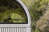 Many of the design elements, such as the barrel vault and associated curved flashings, were experimental and non-standard details. These were developed through prototyping and experimenting with different construction processes to get the desired outcome.