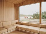 Living area of Kjerringholmen Cabin by Line Solgaard Arkitekter