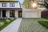 Techo-Bloc’s Aquastorm pavers are designed to allow grass to grow between them, creating a unique play between the softness of grass and the functionality of concrete. They’re also anti-flood and permeable, making them as functional as they are beautiful.  Photo 1 of 760 in Taos by stephen mullens from These 10 Trends Will Define Outdoor Design in 2023