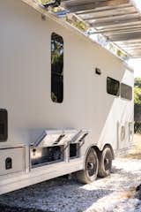 The technological features of the RD24—such as the water purifying system—are concealed in the undercarriage.  Photo 12 of 14 in This $300K Off-Grid Travel Trailer Even Comes With a Walk-In Closet