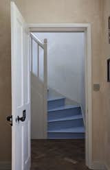 The sky blue stair was inspired by one of Miriam’s childhood memories. “We used to stay in a cottage with a blue staircase and I remember painting them with my dad,” she recalls. “There was always this sense that the blue stairs brought happiness. It’s also a bit of a revolt against the ‘beige on beige’ trend.”