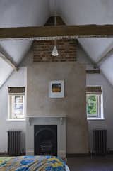 The original chimney breast runs from the kitchen and up through one of the first floor bedrooms. Original timber beams and restored brickwork add to the rustic charm of the space.