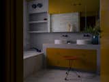 <span style="font-family: Theinhardt, -apple-system, BlinkMacSystemFont, &quot;Segoe UI&quot;, Roboto, Oxygen-Sans, Ubuntu, Cantarell, &quot;Helvetica Neue&quot;, sans-serif;">A side table in the style of Mid-Century designer A</span><span style="font-family: Theinhardt, -apple-system, BlinkMacSystemFont, &quot;Segoe UI&quot;, Roboto, Oxygen-Sans, Ubuntu, Cantarell, &quot;Helvetica Neue&quot;, sans-serif;">lbert Larsson in the bathroom.</span>
