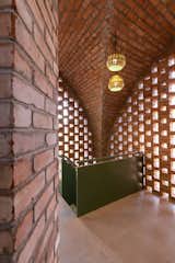 The staircase was designed as a sculptural focal point. “We wanted it to stand out—like an art object in a gallery,” says architect Harikrishnan Sasidharan. “Given the scale of the space, it became the key feature and adds drama to the space.”