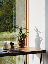 "The white oak frames connect the outside and the interior and frame the natural world," says Michael. "It allows nature—which is really the star—to shine."
