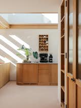 The coffee station sits beneath a retractable skylight. "On a rubbish day the coffee area is fully internal, but when it’s beautiful outside, you’re bathed in sunshine while making a coffee,