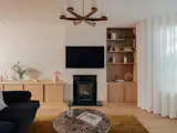 Timber joinery defines the new living area, which sits just off the home’s entrance.
