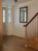 <span style="font-family: Theinhardt, -apple-system, BlinkMacSystemFont, "Segoe UI", Roboto, Oxygen-Sans, Ubuntu, Cantarell, "Helvetica Neue", sans-serif;">The original banister was carefully reinstated in the new fit-out. “It's a nice detail as it's something that has been touched by the hands of previous residents over hundreds of years,</span><span style="font-family: Theinhardt, -apple-system, BlinkMacSystemFont, "Segoe UI", Roboto, Oxygen-Sans, Ubuntu, Cantarell, "Helvetica Neue", sans-serif;">”</span><span style="font-family: Theinhardt, -apple-system, BlinkMacSystemFont, "Segoe UI", Roboto, Oxygen-Sans, Ubuntu, Cantarell, "Helvetica Neue", sans-serif;"> says Benjamin. “And, it doesn’t feel out of place as the curvature works with the other curved, organic elements we introduced.</span><span style="font-family: Theinhardt, -apple-system, BlinkMacSystemFont, "Segoe UI", Roboto, Oxygen-Sans, Ubuntu, Cantarell, "Helvetica Neue", sans-serif;">”</span>