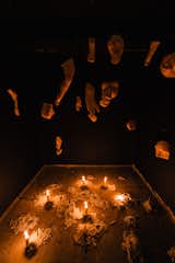 "My favorite concept to think through has been the earthly relationship to the cosmic world—I love working with forms that function both as spiritual agents and reflect the dark world we live in today," says artist Dima Srouji. "I find that wax in particular embodies this duality, it’s hot, dynamic, smells like church, and lights the darkness while itself a tool for potential destruction." This work by Srouji is titled Phantom Votives.