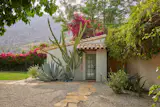 Harriet’s Cottage is one of Casa Cody’s most requested houses, surrounded by bougainvillea and cacti gardens that evoke the spirit of Palm Springs.