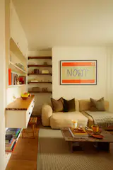 Scott Bennett’s home in East London is characterized by its personal details. "Scott and his partner, an architect also named Scott, made a deliberate decision not to rush to furnish," explains Firmin. "Nothing came in without a story to tell. The result is a space that feels more considered and more personal than most homes people have lived in for decades."