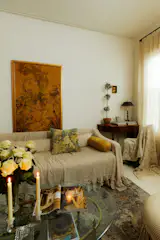 Brigette Muller’s apartment, also featured on Dwell, is filled with items passed down from family members that remind her of their time together. Textiles draped over sofas and chairs create a coherent palette, and she has a "magic drawer" in the kitchen filled with incense and candles. "I’m always thinking about how all five senses shape the feeling of a space," she says.
