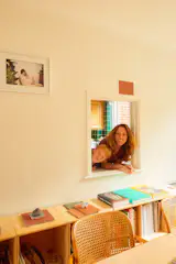 "Zoe Starreveld’s 1960s townhouse in North London stayed with us," says Firmin. "Zoe has never been interested in pristine finishes or show house styling—she sees her home as a stage for daily life, a backdrop for raising her son, Alby, and a testing ground for her design studio. Her&nbsp;approach to the constraints of renting is so pragmatic and so freeing. She simply leaves the things she can’t change—such as the kitchen and the utilitarian bathroom—and works entirely with movable elements, including textiles, plants, objects, and window treatments."