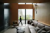 The warm honey tones of the plywood are complemented by polished concrete floors, blued steel fireplace surrounds in the lounge areas, and dark millwork. “It’s a modern-day log cabin, but with all the benefits that technology and science and manufacturing can get for you,” says Tyler.