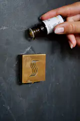 Add a few drops of aromatherapy oil to the steam head or sauna to create a fragrant, enveloping atmosphere.