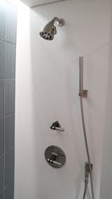Inspired by the simplicity of a common U-bolt fastener, the Strap has a striking industrial feel, yet is equally modern in appearance. The Strap is at home in an urban loft as well as a modern condo setting. The standard split finish of Satin Black and Satin Nickel highlights the uniqueness of this design.
 
Be sure to see the Strap Collection's remarkable concealed shower system and coordinated bath accessories to complete the master suite.