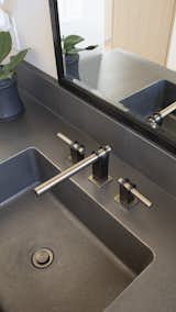 Inspired by the simplicity of a common U-bolt fastener, the Strap has a striking industrial feel, yet is equally modern in appearance. The Strap is at home in an urban loft as well as a modern condo setting. The standard split finish of Satin Black and Satin Nickel highlights the uniqueness of this design.
 
Be sure to see the Strap Collection's remarkable concealed shower system and coordinated bath accessories to complete the master suite.  Photo 12 of 51 in The Strap Collection by Sonoma Forge