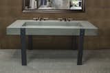 The Iron Lady Concrete Bath Sink In Guaranteed Stain-Free NuCrete® Concrete
From our stunning collection of concrete TroughSinks, The Iron Lady features a simple and utilitarian box basin with softened corners and edges and stands on solid steel legs that are fitted into the sink itself. The basin appears flat but slopes gently to the drain to prevent pooling. Shown with MetalCrete® concrete cladding and Strap Designers Faucets from Sonoma Forge!