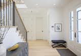 Hallway and Light Hardwood Floor  Photo 4 of 12 in Glenwood Modern Farmhouse by Goldcon Construction